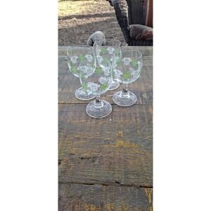 4- wine goblets featuring a white and green grape and barrel motif